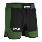 SMAI MMA Grappling Shorts in Black/Olive Green feature a white "SMAI" logo on the waistband and left leg, polycotton fabric, elastic waistband, Velcro closure, and a stretch gusset for comfort and mobility.