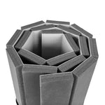 A top-down view of a rolled-up SMAI Roll Out Workout Mat – Dollamur Flexi Roll in light grey, featuring rectangular sections and arranged spirally for convenient home training.