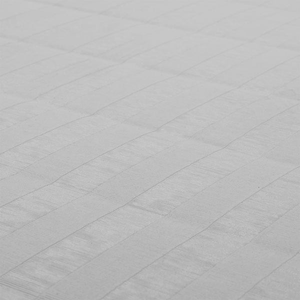 Close-up of the light grey SMAI Roll Out Workout Mat (Dollamur Flexi Roll), showing its white textured surface and subtle repeating checkered pattern, reflecting the mat's durable, high-quality material.