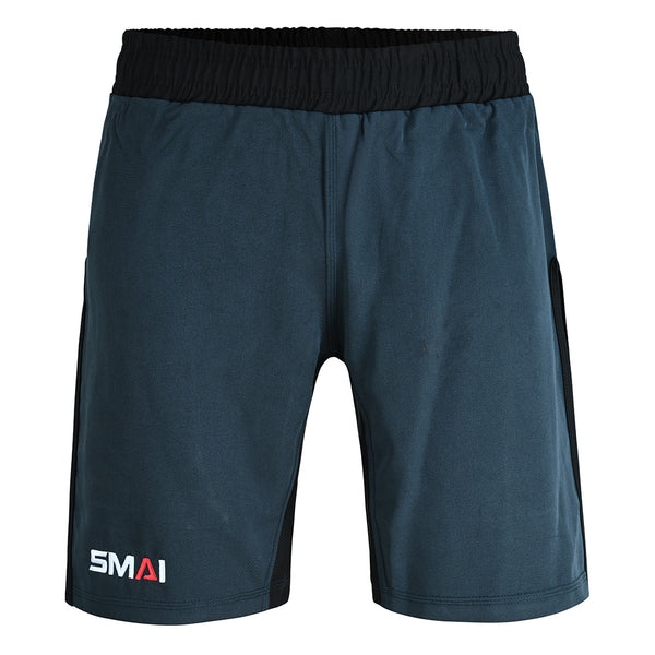 SMAI Hybrid MMA Grappling Shorts in black and grey feature a black elastic waistband, grey side panels, and the white/red SMAI logo on the left leg. The fight shorts are shown against a white background.