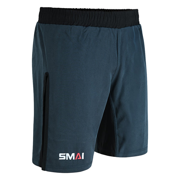 SMAI Hybrid MMA Grappling Shorts in black and grey with a black elastic waistband, vertical side detailing, and the SMAI logo on the lower left leg. Ideal as fight shorts for MMA training or grappling.