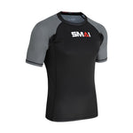 The SMAI Short Sleeve Rash Guard - Grey features black front and back panels, gray sleeves, and a white/red "SMAI" chest logo. This fitted compression shirt is perfect for MMA or no-gi BJJ training sessions.