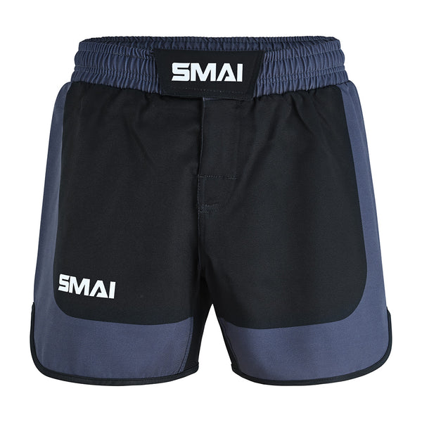 SMAI MMA Grappling Shorts - Black/Grey feature an elastic waistband, Velcro closure, stretch gusset, and durable fabric. Branded with the SMAI logo on the waistband and left leg—ideal for training.