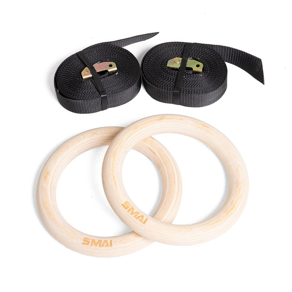 The SMAI Wooden Gym Rings with Numbered Straps include two wooden rings featuring SMAI branding and two black numbered straps with metal buckles, shown on a white background.