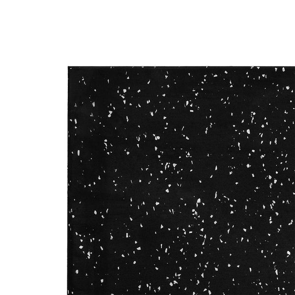 A black rectangular surface with small, irregular white specks positioned in the lower right of a white background evokes the look of the SMAI Rubber Gym Flooring Tile - 15mm - White Fleck—offering durable, non-slip support ideal for premium gym environments.
