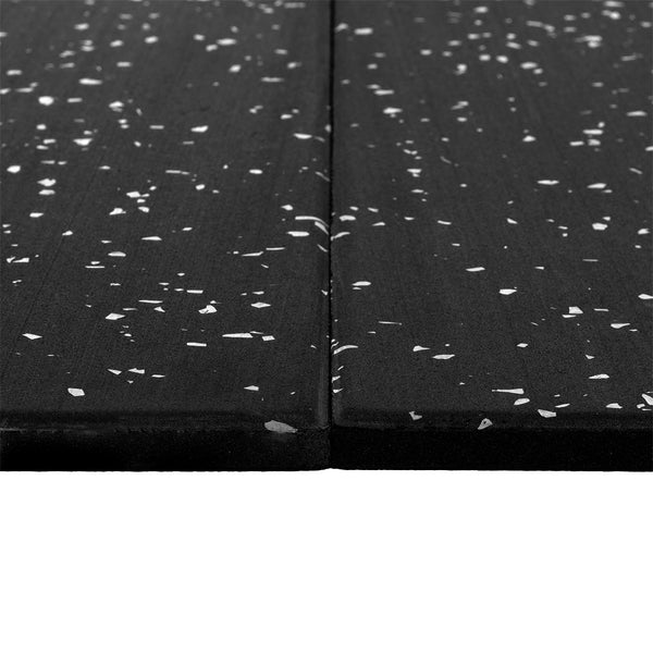 Close-up of two SMAI Rubber Gym Flooring Tiles - 15mm - White Fleck, placed side by side on a white background. The tiles feature visible seams where they join, making them ideal for use as gym flooring or non-slip rubber mats that enhance safety and durability.