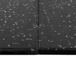 Two SMAI Rubber Gym Flooring Tiles - 15mm - Grey Fleck are placed side by side on a white background, showing a close-up of their textured surfaces and joined edges. These durable, non-slip tiles are designed to enhance safety in fitness spaces.