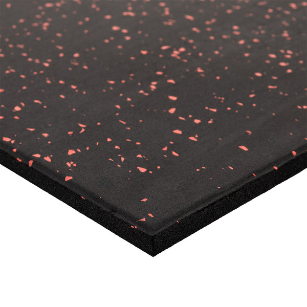 A close-up of SMAI Rubber Gym Flooring Tile - 15mm - Red Fleck shows its thick, textured, non-slip black surface with red speckles from an angled perspective.