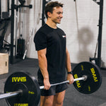 Man deadlifting HD Bumper Plates (Pair) - 15kg