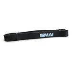 A medium resistance band from the SMAI brand, ideal for glute toning, is displayed coiled and laid flat against a plain white background, with "SMAI" printed in white on one side.