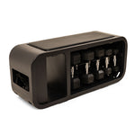 The SMAI Multi Weight Bench - Dumbbell, Resistance Band and Hand Weight Set is a black rectangular bench with rounded edges, an open side compartment, slots for hex dumbbells, and a padded top for comfortable seating or exercise.