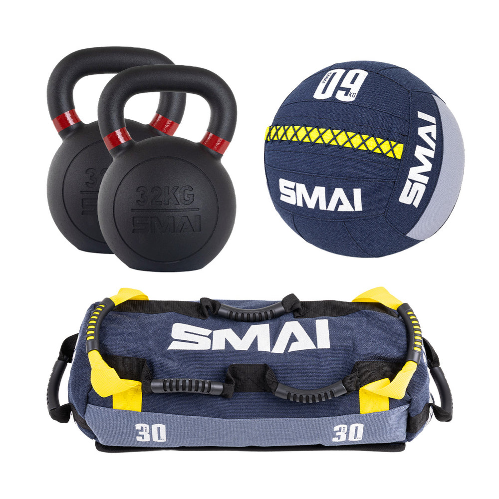 The SMAI Hybrid Home Gym Men's Pro Starter Pack includes two black kettlebells, a blue and yellow medicine ball, and a matching weighted sandbag—perfect functional fitness gear for your home gym.