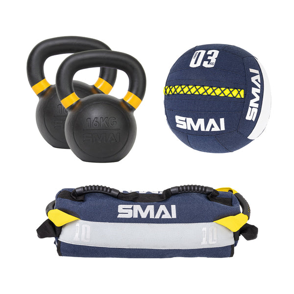 The Hybrid Training Home Gym Women's Starter Pack by SMAI includes two black kettlebells with yellow handles, a blue and white 3kg medicine ball, and a blue, gray, and yellow weighted sandbag—ideal for home workouts.