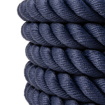 Close-up of several SMAI Hybrid Training Power Ropes (15m x 35mm), navy blue and competition-grade, featuring a braided texture and neatly coiled, stacked against a white background.