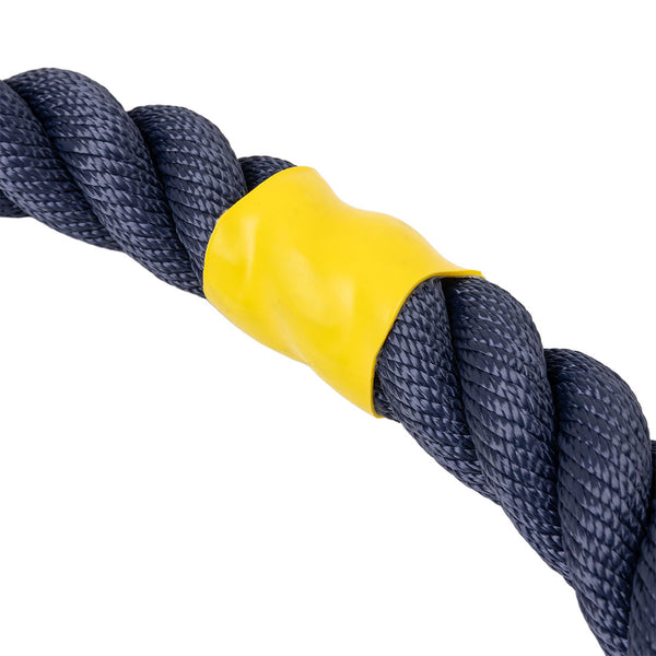 A close-up of the SMAI Hybrid Training Power Rope - 15m x 35mm, featuring a thick, twisted black design with a yellow plastic band wrapped tightly around it.