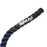 A close-up of the SMAI Hybrid Training Power Rope - 15m x 35mm in dark blue, featuring a black textured grip handle with the white "SMAI" logo printed on it.