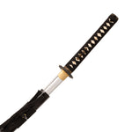 A close-up of the SMAI Katana - High Carbon Black shows its handle wrapped in black fabric with a diamond pattern and the silver blade partially drawn from the black scabbard.