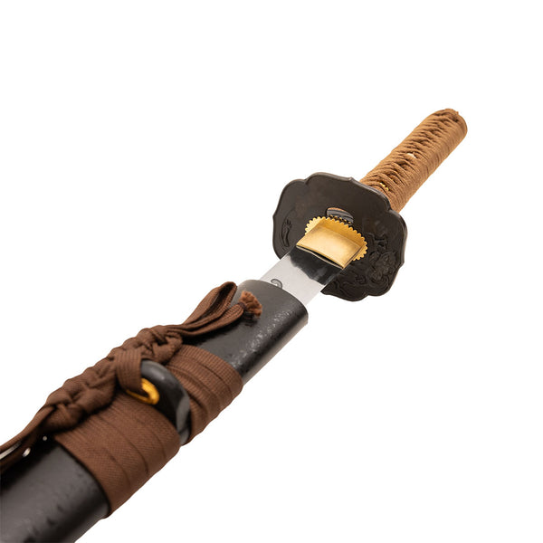 A close-up shows the SMAI Forged Katana - Black Copper Dragon, partially drawn from its black sheath, featuring a brown-wrapped handle, ornate guard, and a glimpse of the polished blade.