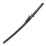 The SMAI Katana - Emerald Dragon features a dark green-wrapped handle, matching cord, full tang construction, and a clay-forged Hamon. It comes sheathed in a black scabbard and is displayed on a plain white background.