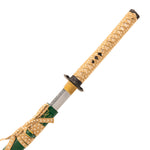 A close-up of the SMAI Medium Carbon Steel Green Katana - Ancient Dynasty, featuring a tan woven hilt and guard, partially drawn from its green scabbard adorned with a matching tan cord.