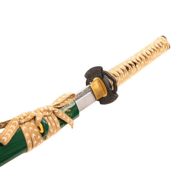 A close-up of the SMAI Medium Carbon Steel Green Katana - Ancient Dynasty, partially drawn to reveal its braided tan handle, decorative guard, and shiny blade—an ideal display piece inspired by traditional samurai swords.