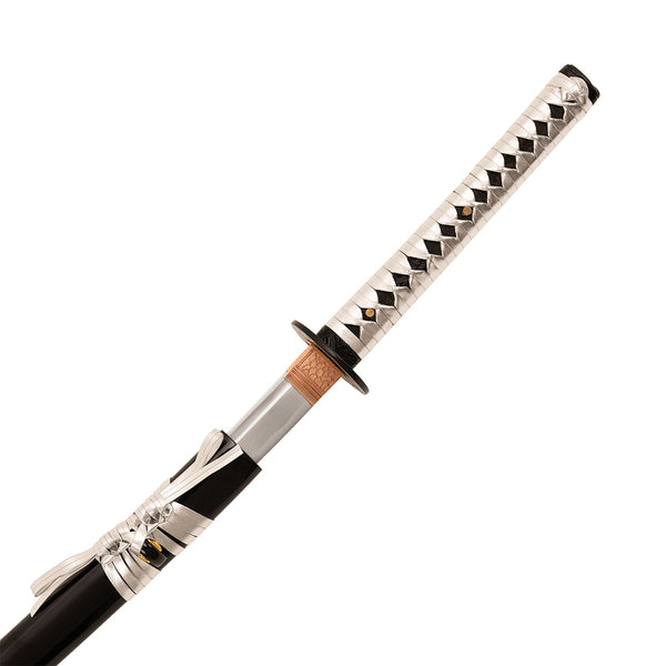 A close-up of the SMAI Display Carbon Katana - Black Dragon Rose Tip being partially drawn from its sheath, revealing a silver and black diamond-patterned handle with detailed wrappings and a subtle gold dragon motif.