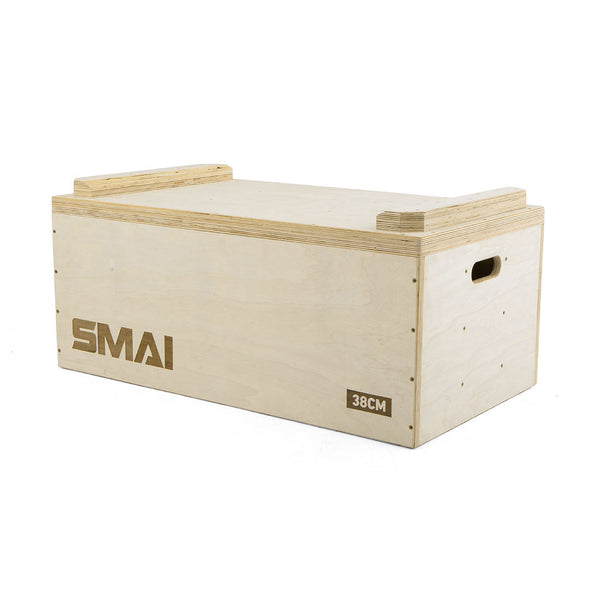 A pair of SMAI Jerk Blocks with handles and "SMAI" plus "38CM" printed on the side. Like weightlifting blocks, they feature a smooth finish and reinforced corners for durability.