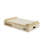 A pair of rectangular wooden "SMAI" Jerk Blocks, each labeled "15CM," featuring two side handles and raised top edges—perfect for use as Plyometric Boxes or Weightlifting Blocks in versatile gym routines.