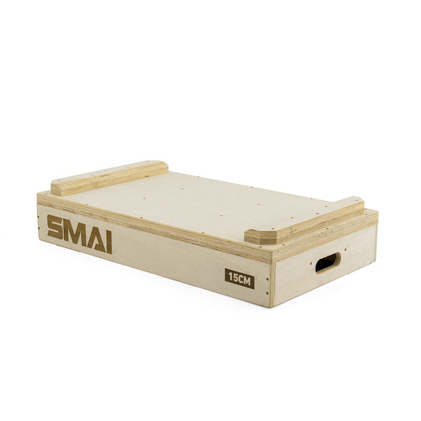 A pair of rectangular wooden "SMAI" Jerk Blocks, each labeled "15CM," featuring two side handles and raised top edges—perfect for use as Plyometric Boxes or Weightlifting Blocks in versatile gym routines.