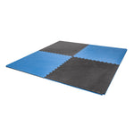 The SMAI Jigsaw Mat - 2cm - Factory Seconds features four interlocking EVA mats with cosmetic imperfections, arranged in alternating blue and black, and a textured surface.