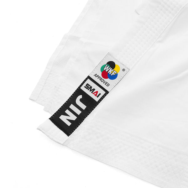 Close-up of the WKF Karate Uniform Pack - 8oz Premium Kumite Gi - Jin by SMAI, a white karate uniform with "WKF APPROVED," "SMAI," and "JIN" labels, detailed stitching, perfect for martial arts competitions.