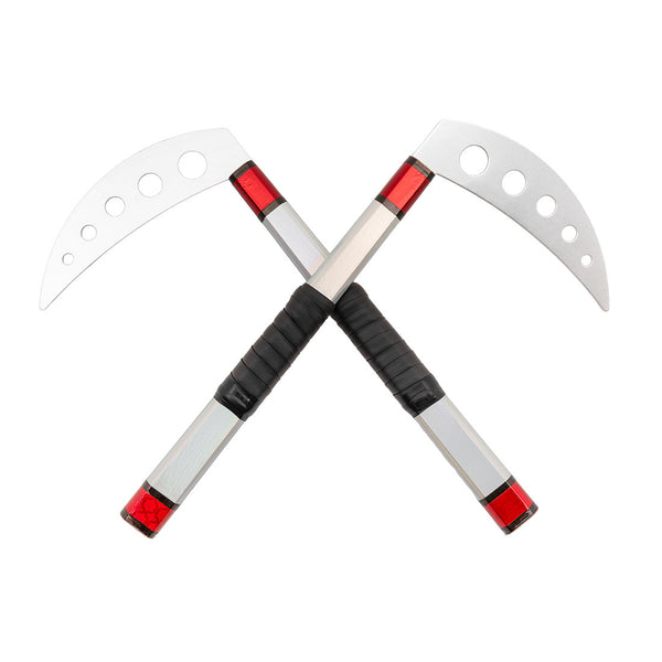 Two red-handled SMAI Kama Prism Demo sickles with silver blades and circular cutouts are crossed in an X shape against a white background, highlighting this popular martial arts demonstration weapon.