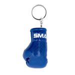 The SMAI Boxing Glove Keyring features a miniature blue glove with "SMAI" on the wrist—a unique and fun boxing gift for fans.