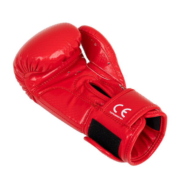 The SMAI Essentials Kids Boxing Glove - Red features a shiny finish, velcro strap, and CE marking. Shown singly on a white background, it’s ideal for those seeking quality children's boxing gloves.