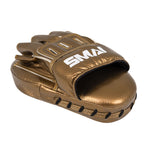 A single gold SMAI Essentials Boxing Mitt with black stitching and white "SMAI" branding on the wrist strap, shown on a white background next to a black focus mitt.