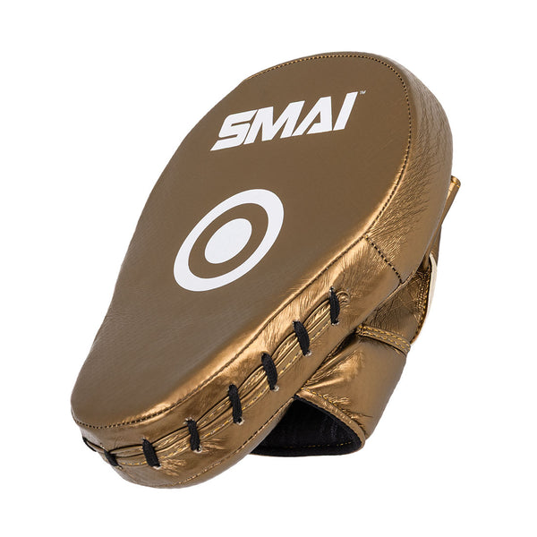The SMAI Essentials Boxing Mitts - Gold feature black stitching, a white target circle, and the brand name "SMAI" on the front. The angled punching pad displays both front and side views.