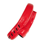 A single Essentials Boxing Mitt by SMAI in bright red with black laces and stitching, shown from the side on a white background.
