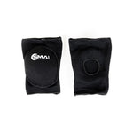Two black SMAI Padded Knee Guards (Extra Small) are shown flat on a white background. One displays the SMAI logo and padded oval front; the other shows a circular opening at the back, ideal for judo and martial arts.