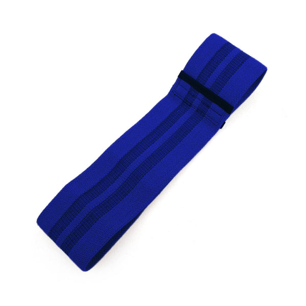 The Sweat1000 Knitted Mini Band Heavy Blue from No Sync To Channel Engine, made of durable polycotton with darker blue stripes, is neatly folded on a plain white background.