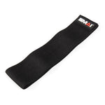 A black Knitted Mini Resistance Band, ideal for glute activation exercises, is displayed on a white background. It has a textured surface and includes a small rectangular label featuring the No Sync To Channel Engine logo on one end.