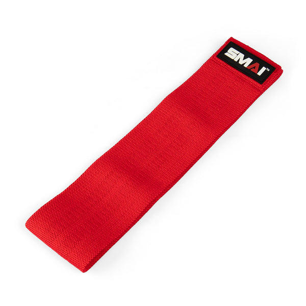 A resistance band from the Knitted Mini Resistance Bands - Set of 3 with carry pouch set, featuring a red color with a black label displaying "SMAI" on a white background, perfect for glute activation and enhancing your workout routine.
