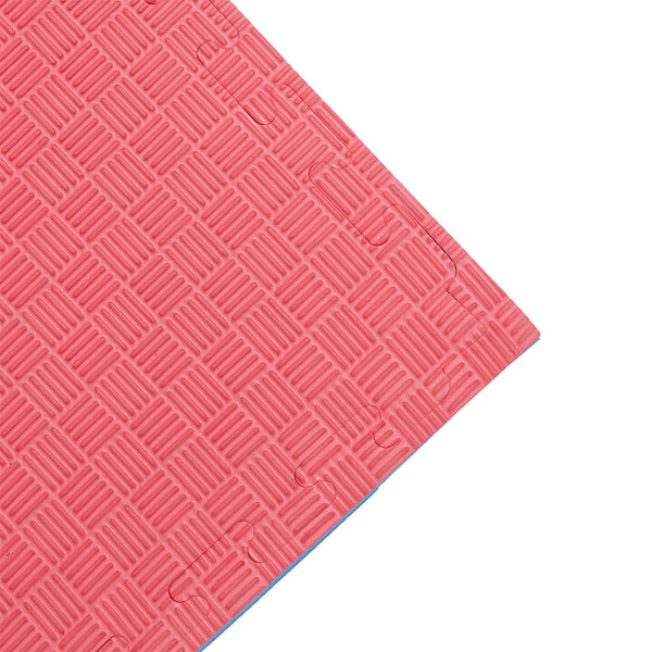 A close-up of the SMAI Jigsaw Mat - 2cm Korean Style (Factory Seconds with cosmetic imperfections), featuring a red, grid-textured surface, shown against a white background.