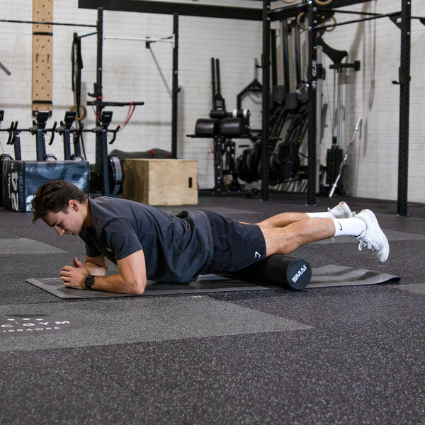 Man using SMAI Foam Roller - Full Length Black Side view