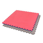 Two large SMAI Jigsaw EVA Mat - Value Range - 2cm mats, one red and one gray, feature textured surfaces and interlocking jigsaw edges—ideal for gym flooring or home workouts.