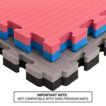 Three SMAI Jigsaw EVA Mats from the Value Range, in red/blue and gray/black, are stacked together. A label underneath states: “IMPORTANT NOTE: NOT COMPATIBLE WITH SMAI PREMIUM MATS.” These 4cm thick EVA foam mats by SMAI offer a safe and durable flooring solution, ideal for martial arts training areas.