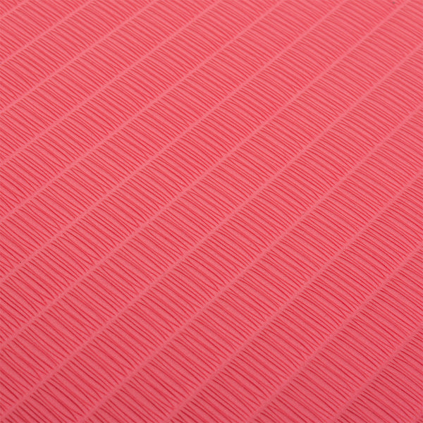 Close-up of the SMAI Jigsaw EVA Mat - Value Range - 4cm, showing its textured pink surface with evenly spaced diagonal rows of raised, thin rectangular ridges typical of high-quality SMAI mats.
