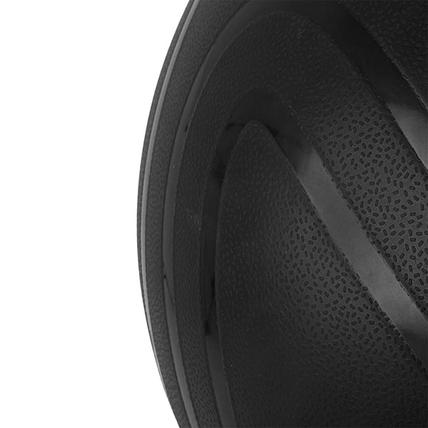 Close-up of the SMAI The Yard - Slam Ball 30kg, featuring a textured black rubber surface with visible grooves, set against a white background.