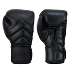 The SMAI Memory Tec Leather Boxing Glove in black features padded knuckles, wrist straps, and memory tech foam. One glove is shown front side, the other palm side.
