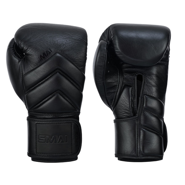 The SMAI Memory Tec Leather Boxing Glove in black features padded knuckles, wrist straps, and memory tech foam. One glove is shown front side, the other palm side.