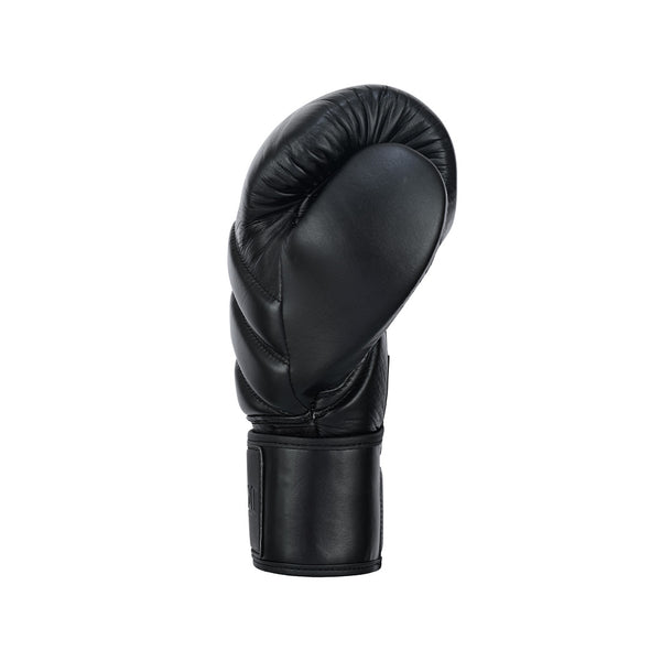 The SMAI Memory Tec Leather Boxing Glove - Black is shown upright against a white background, palm facing back and thumb beside the fingers. Made from cowhide leather, it features memory tech foam for enhanced support.